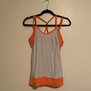 Orange and white workout top